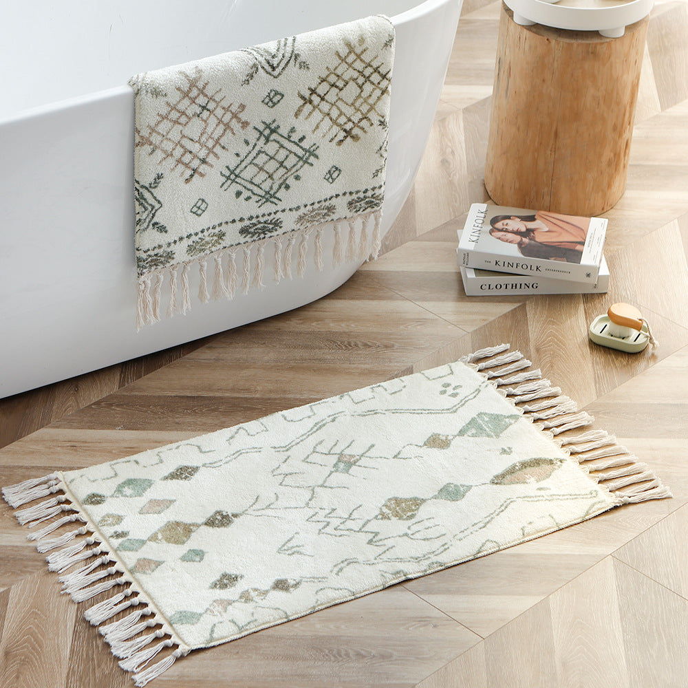 Boho cotton bath mat with fringes and geometric diamond pattern Stornfield