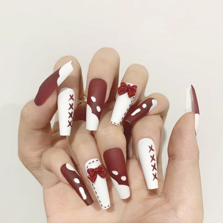 Artful stiletto nails with decoration and glitter Stornfield