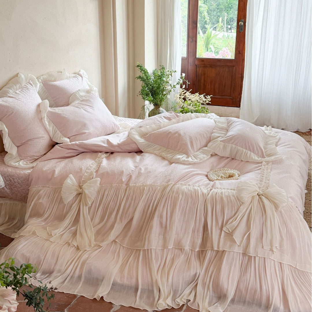 Elegant pleated bed set with gathered bed skirt and decorative pillows