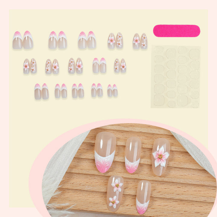 Artificial nail set with floral designs Stornfield
