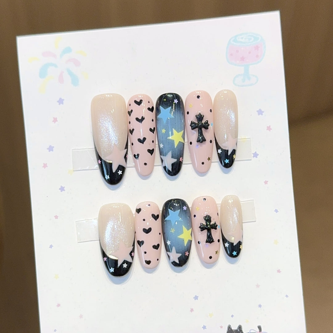 Artificial nail tips with playful star and heart designs Stornfield