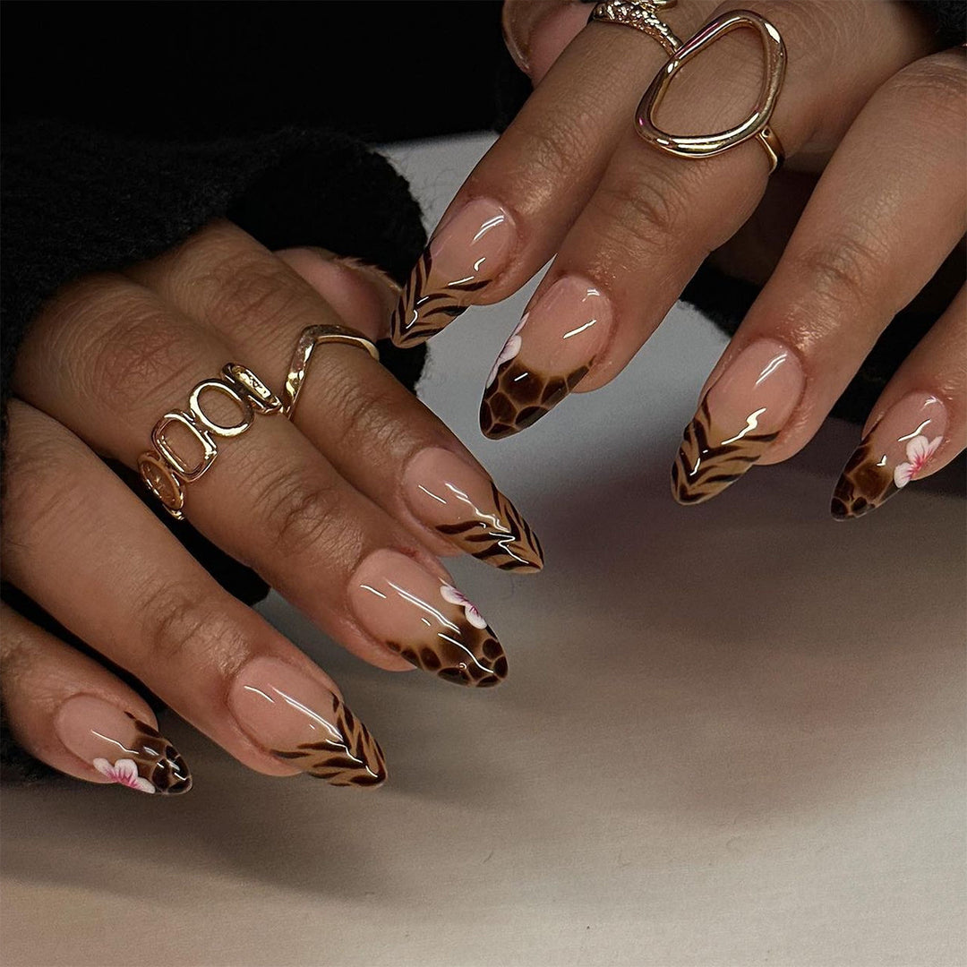 Artful Stiletto nails with floral accent Stornfield
