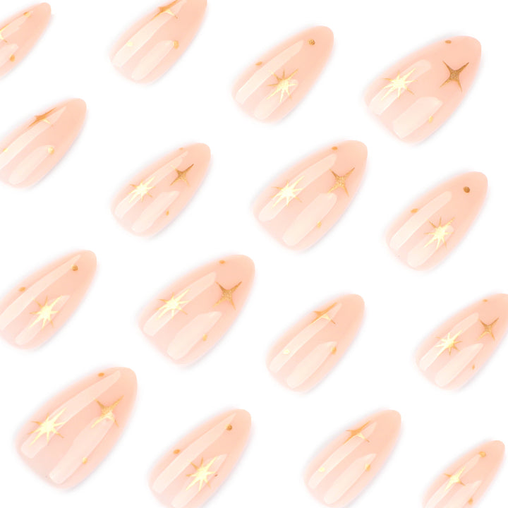 Artful stiletto nails with shiny star accents Stornfield