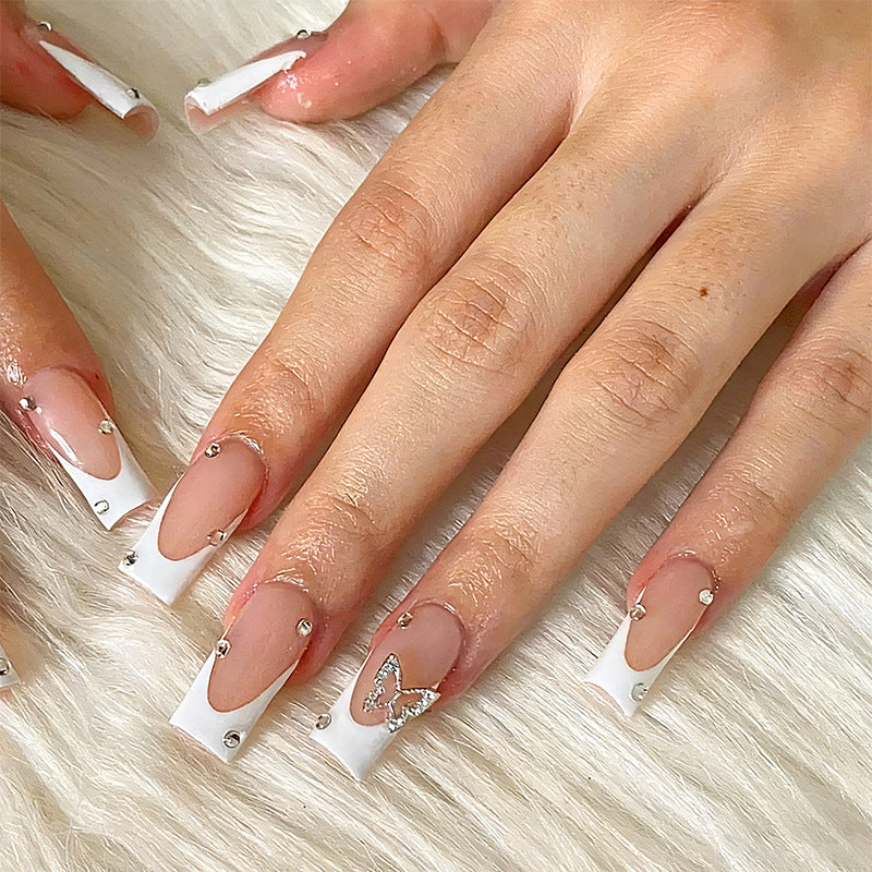 Artful Nail Set with Butterfly Decoration Stornfield