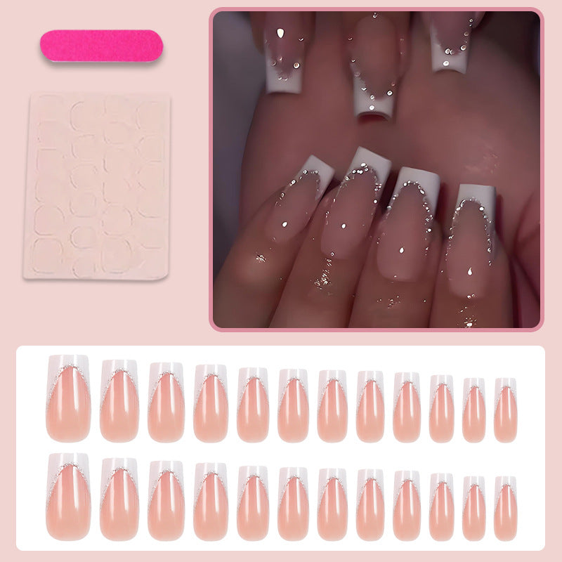 Artificial nail set with elegant French tip and glitter accents Stornfield