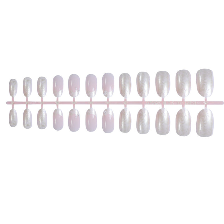 Artificial nail set with shimmering pearl and glittering accents Stornfield