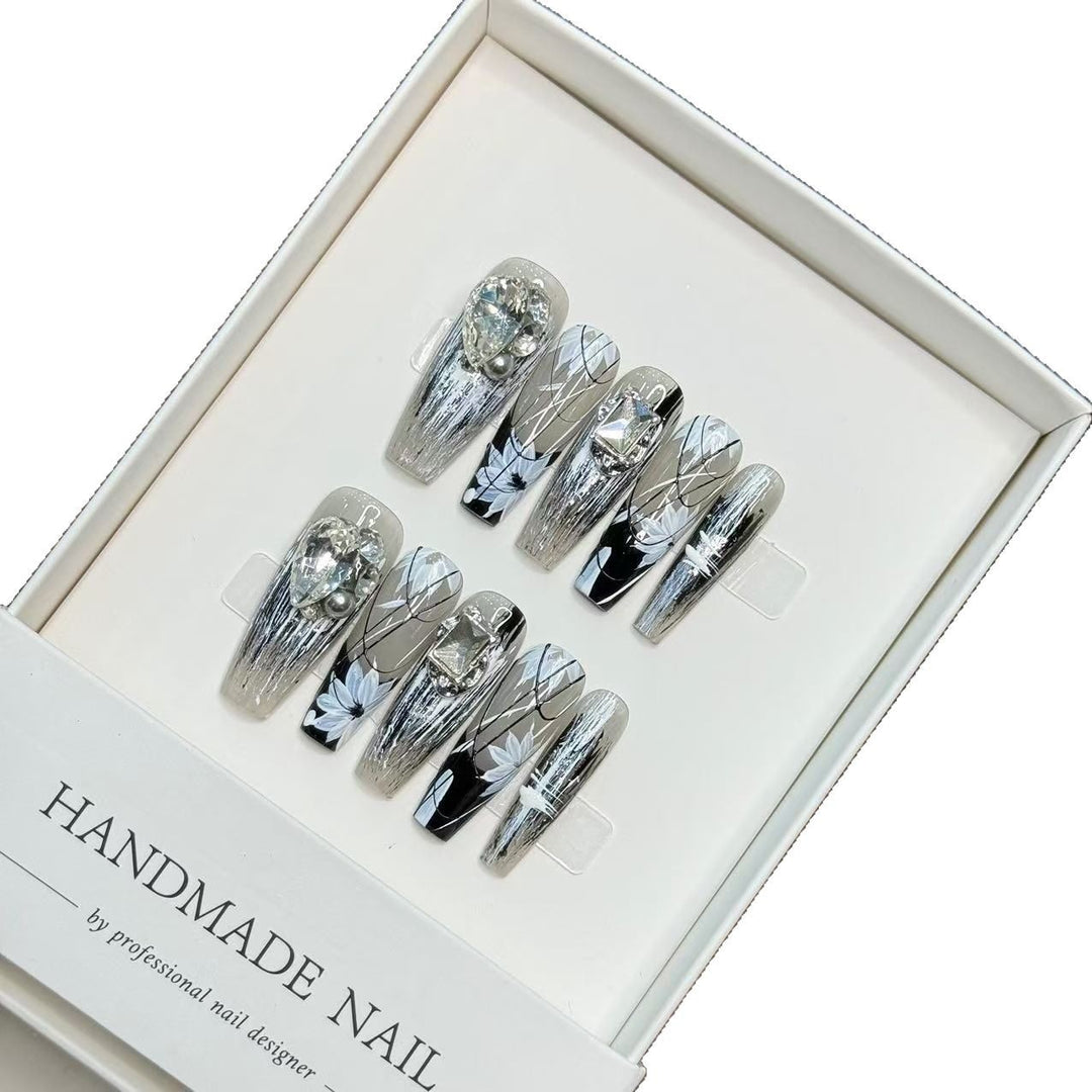 Artistic Handcrafted Press-On Nail Set with Floral and Gem Accents