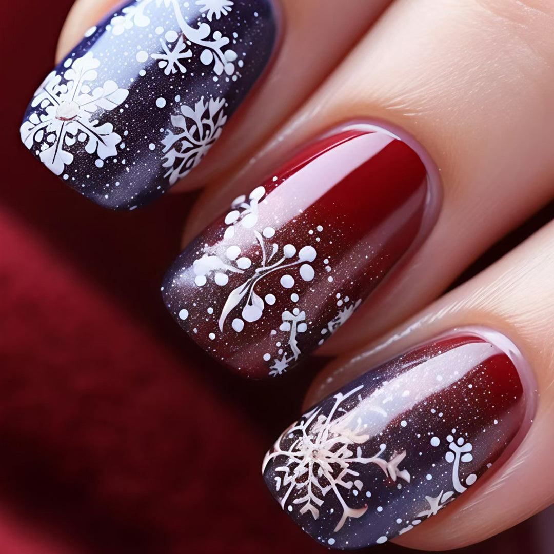 Artificial nails with festive glitter effect and wintry snow motif Stornfield