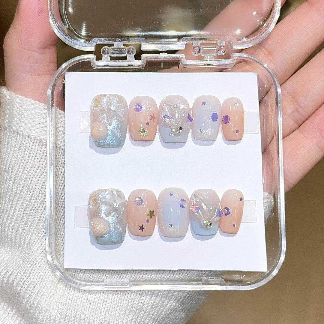 Artificial nails with sparkling galaxy design Stornfield