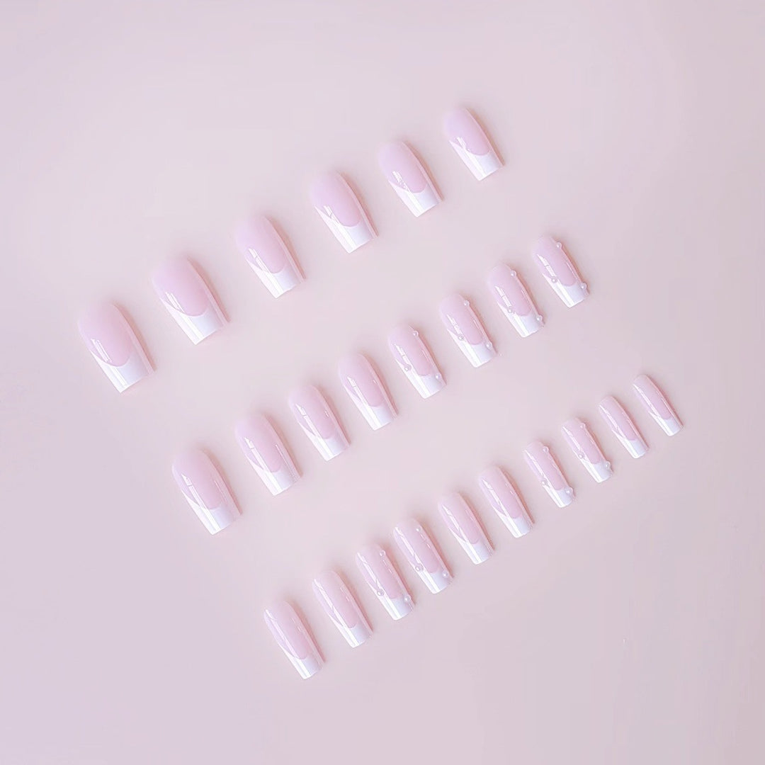Artificial nail tips with elegant pearl accents Stornfield
