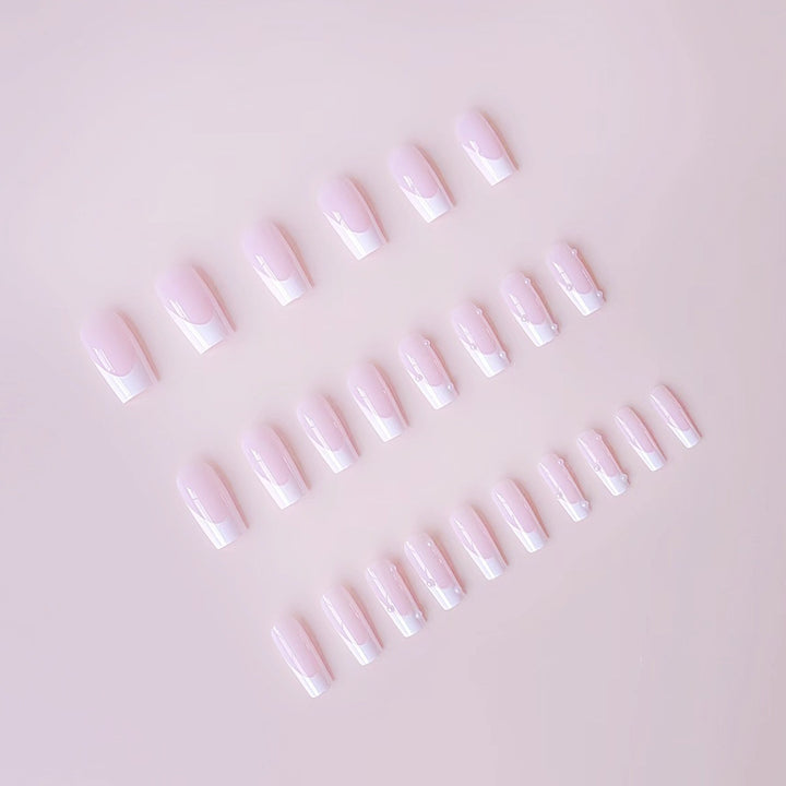 Artificial nail tips with elegant pearl accents Stornfield