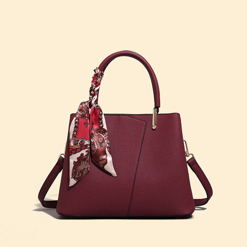 Stylish Structured Handbag with Decorative Scarf
