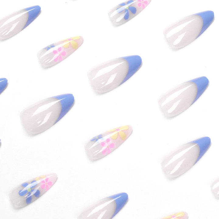 Artificial nail art with floral design and gradient Stornfield