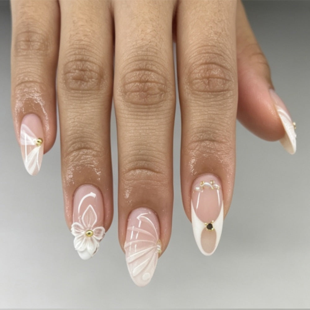 Artificial nails with elegant flower design and glitter accents Stornfield