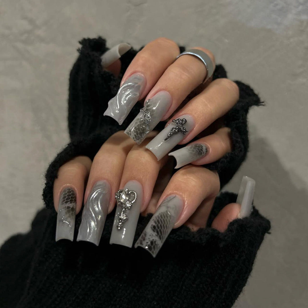 Artful Nail Extensions with Noble Accents Stornfield