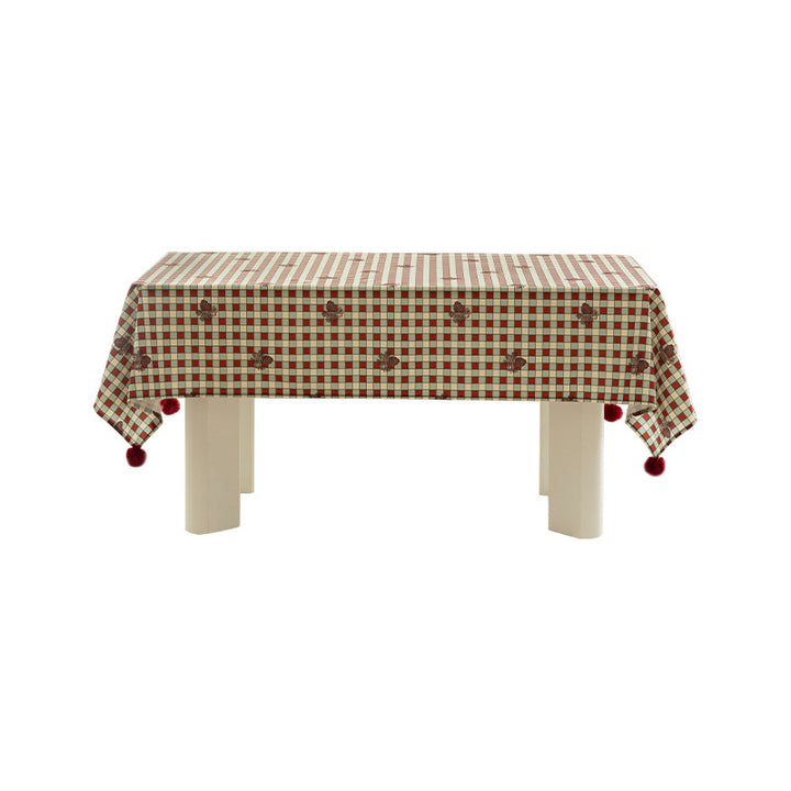 Rectangular decorative tablecloth with checkered pattern, pompom trim, and fine embroidered applique Stornfield