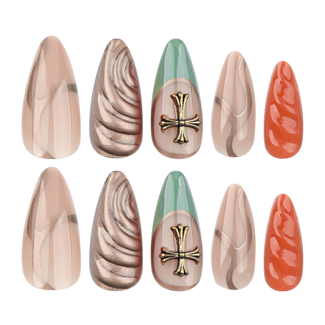 Artful stiletto nails with glitter and motif decorations Stornfield