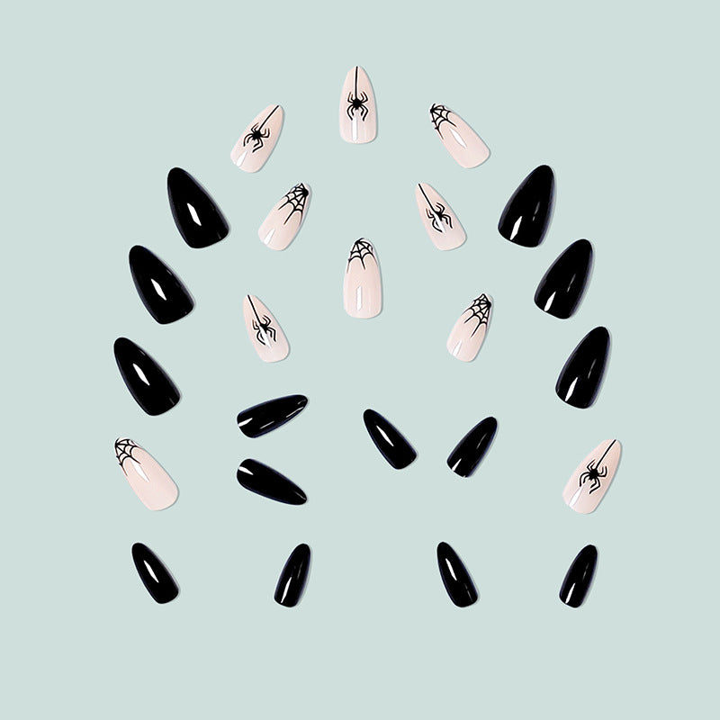 Artistic nail art with spider motif Stornfield