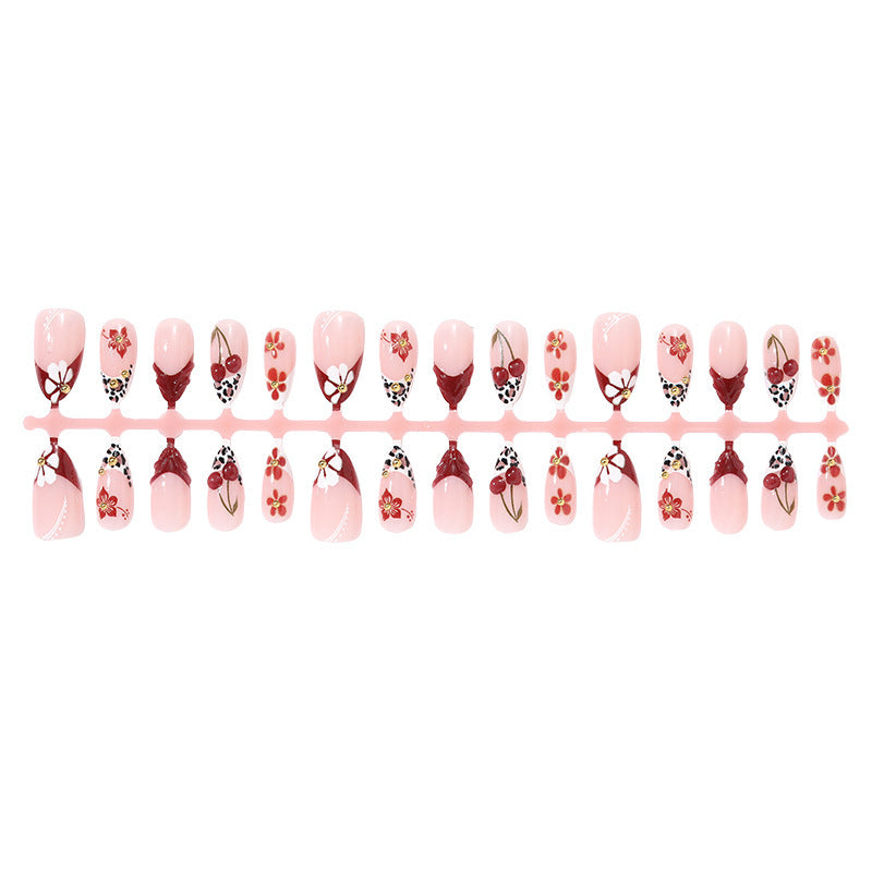 Artificial nail set with floral 3D designs and elegant accents Stornfield