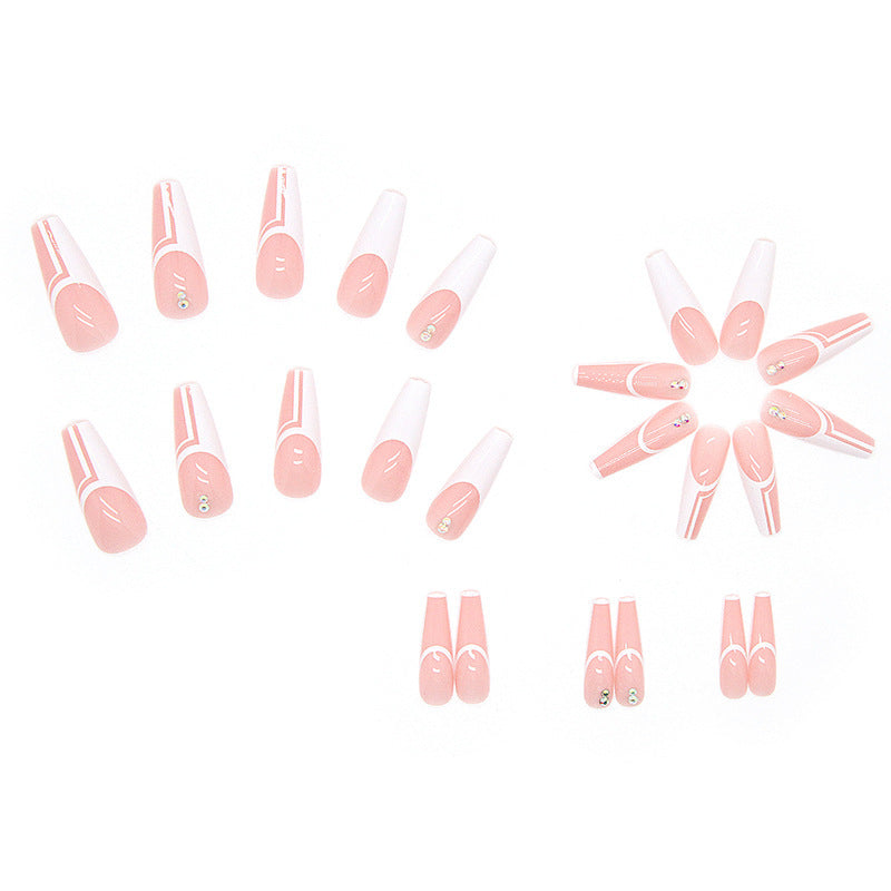 Artificial nails with elegant geometric designs and glossy finish Stornfield