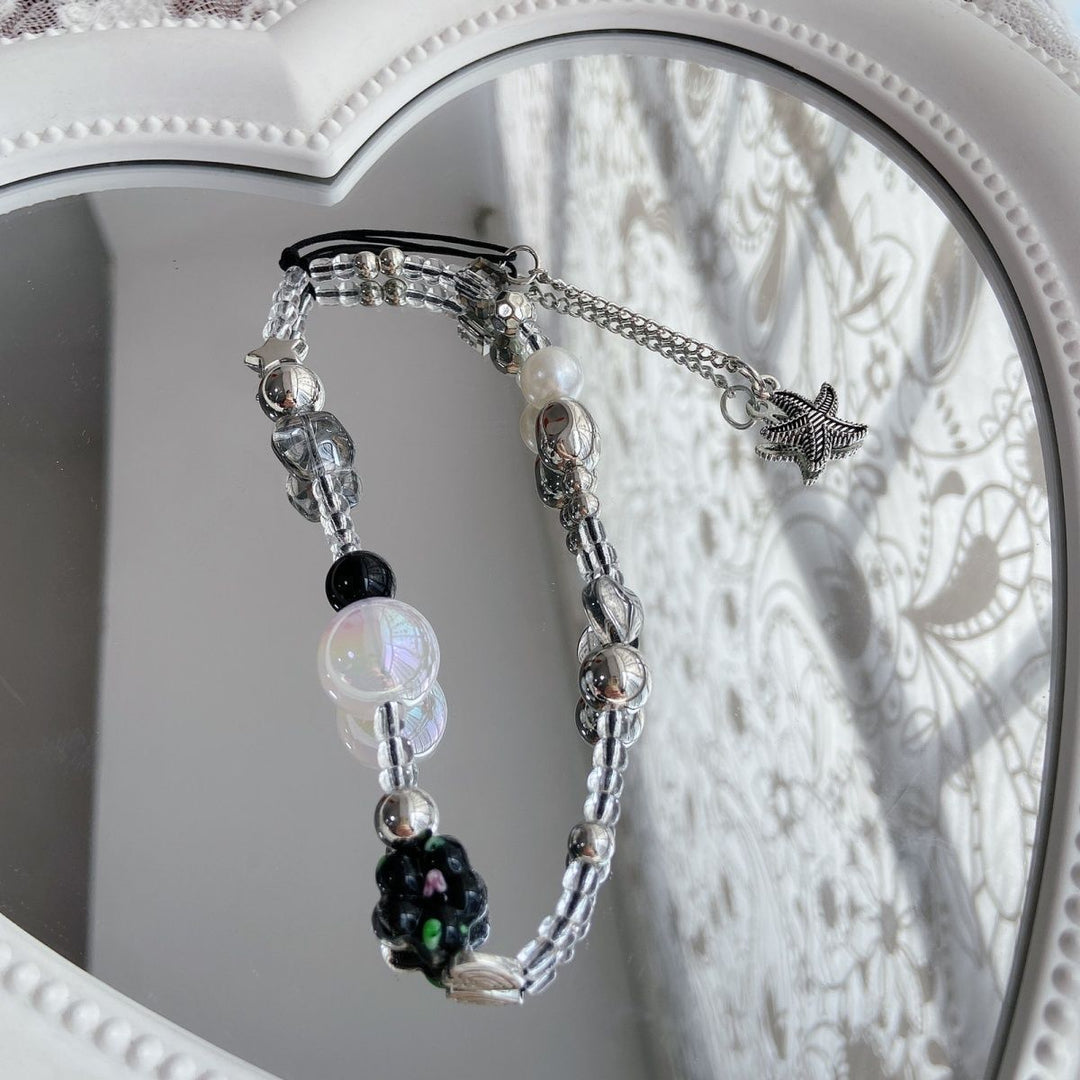 Elegant Beaded Charm Eyewear Holder Stornfield