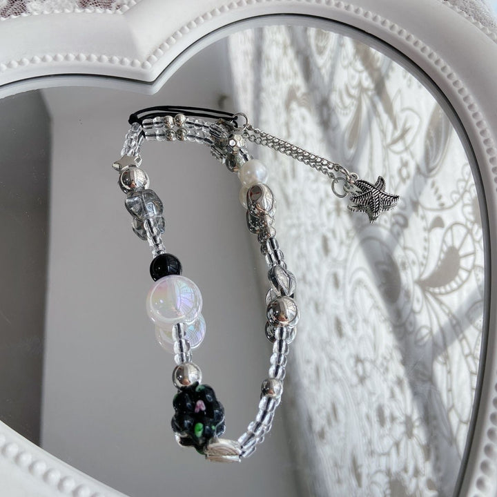 Elegant Beaded Charm Eyewear Holder Stornfield