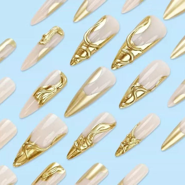 Artificial nails with golden, curved accents Stornfield