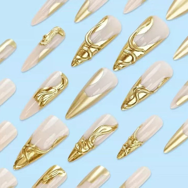 Artificial nails with golden, curved accents Stornfield