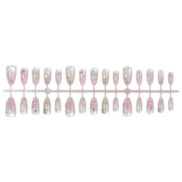 Glittering artificial nails with floral design Stornfield