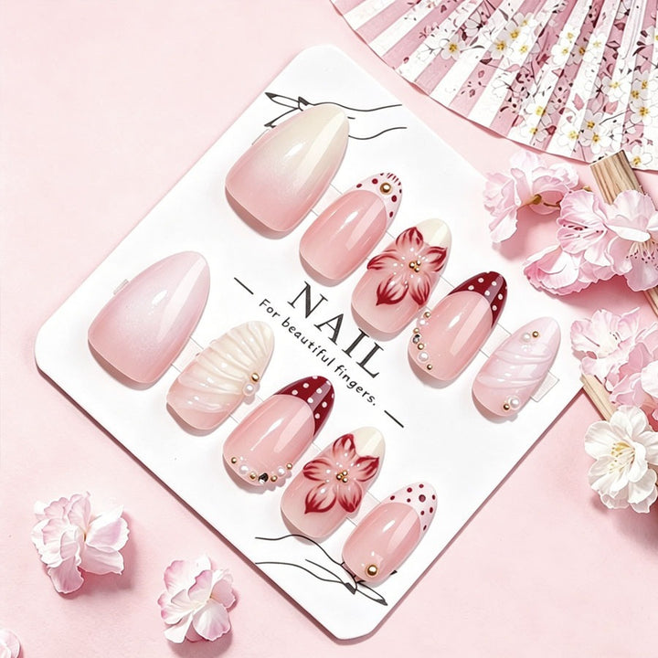 Artificial nail set with floral details and glitter accents Stornfield