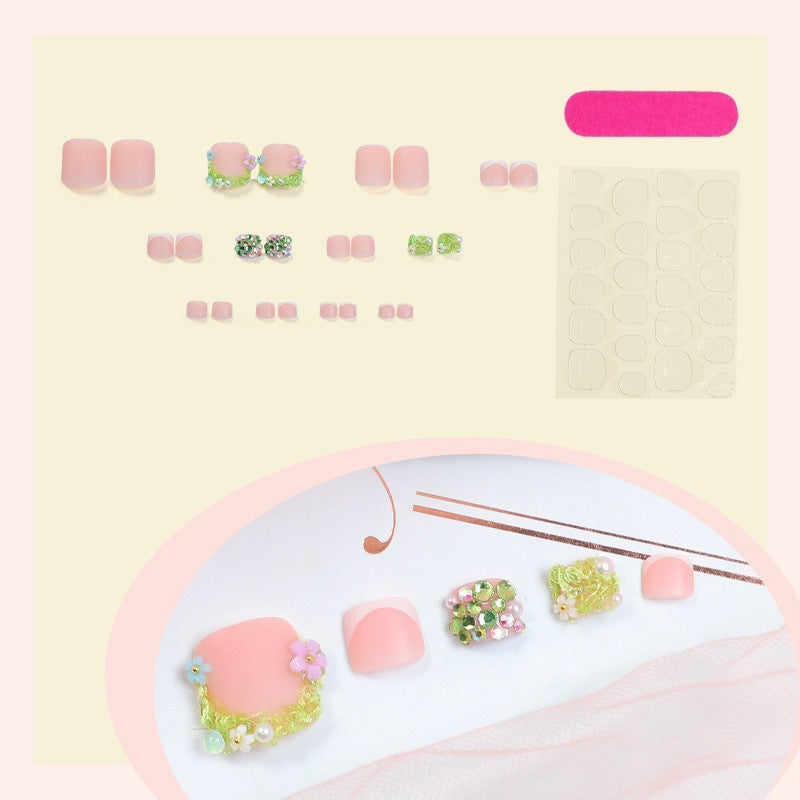 Artificial nail set with floral 3D details and glitter embellishments Stornfield