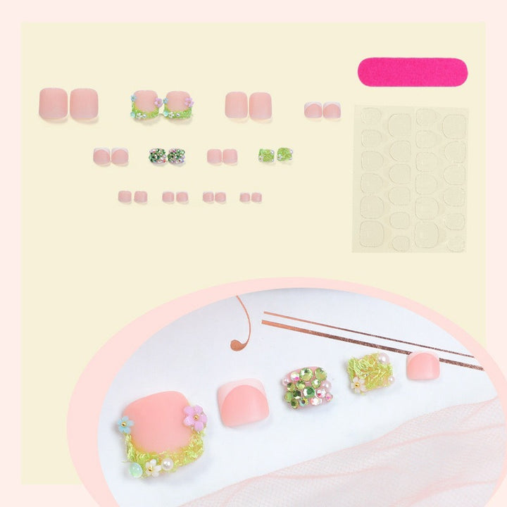 Artificial nail set with floral 3D details and glitter embellishments Stornfield