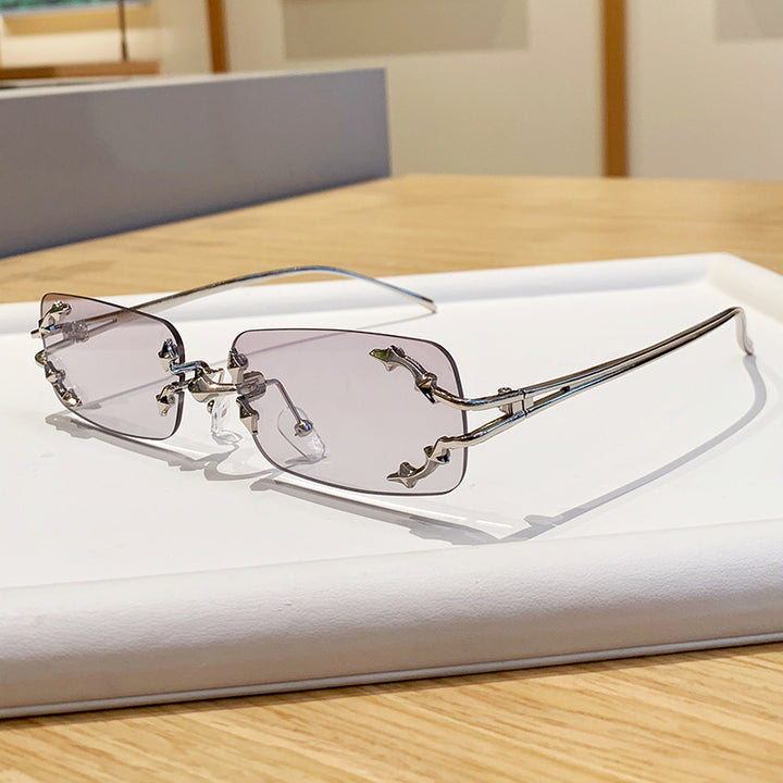 Women's fashionable sunglasses with delicate metal frame and transparent lenses Stornfield