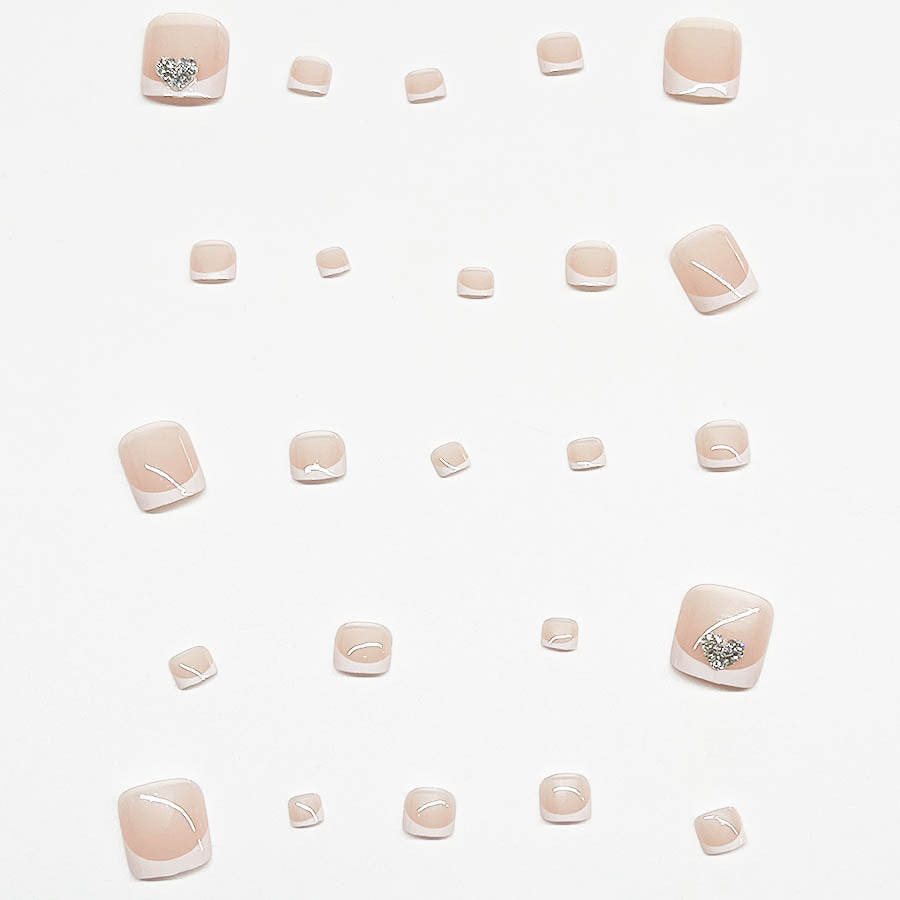 Artifical nail set with glamorous heart design and elegant French tip Stornfield