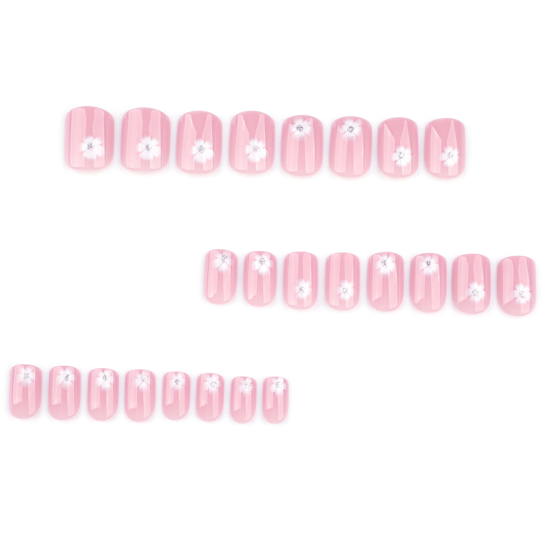 Elegant artificial nails with filigree floral motifs and glitter accents Stornfield