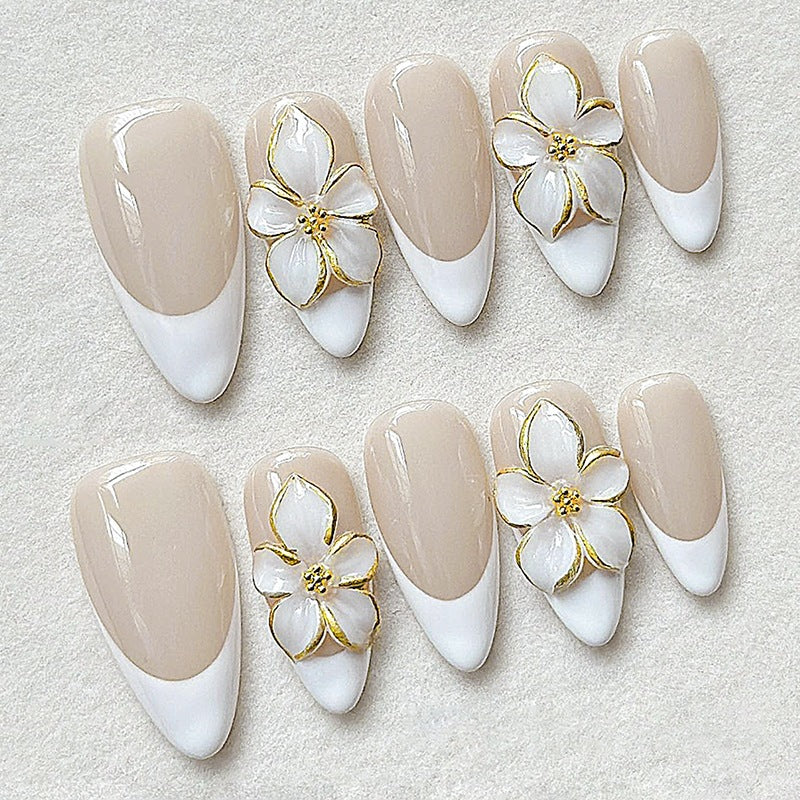 Artificial nail set with floral accents and luxurious glitter Stornfield