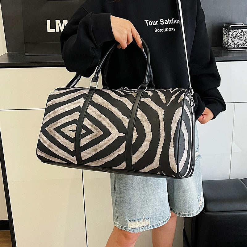 Sporty travel bag in trendy zebra pattern Stornfield