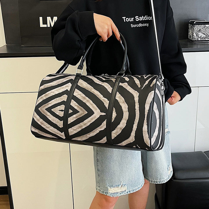 Sporty travel bag in trendy zebra pattern Stornfield