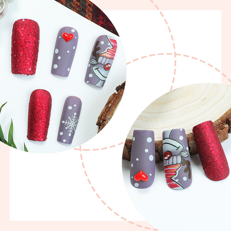 artful nail set with festive glitter and Christmas motifs Stornfield