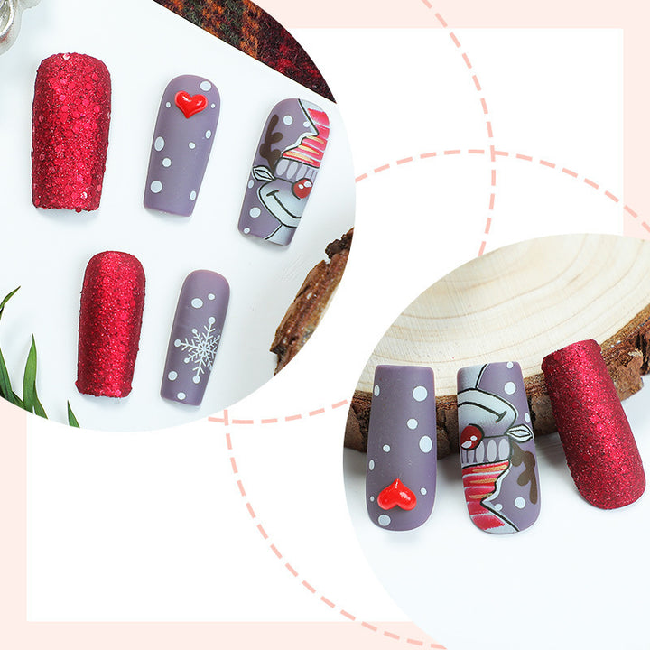 artful nail set with festive glitter and Christmas motifs Stornfield