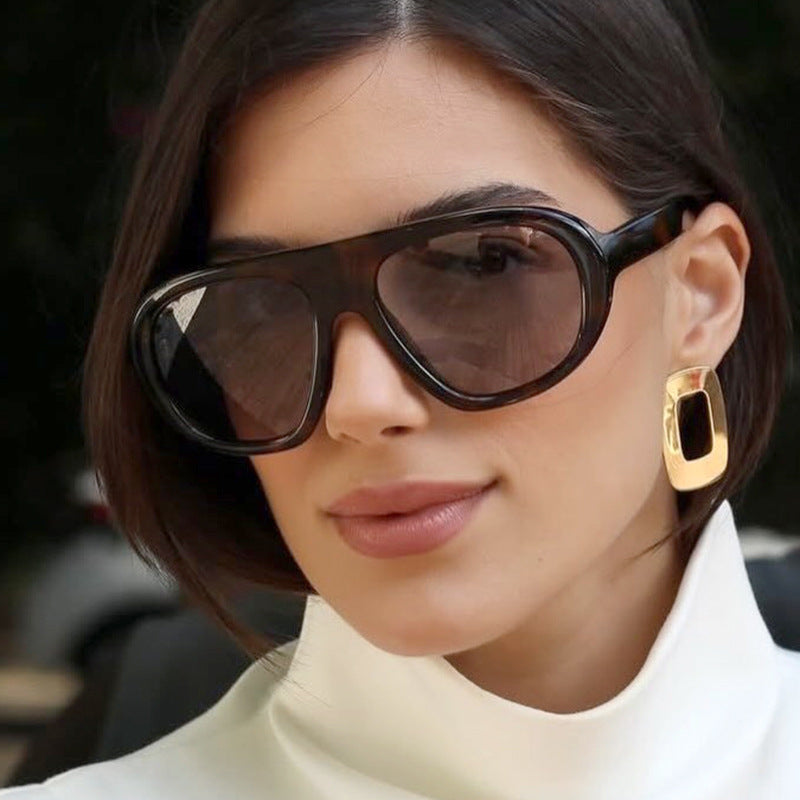 Women striking sunglasses with futuristic frame and sturdy design Stornfield