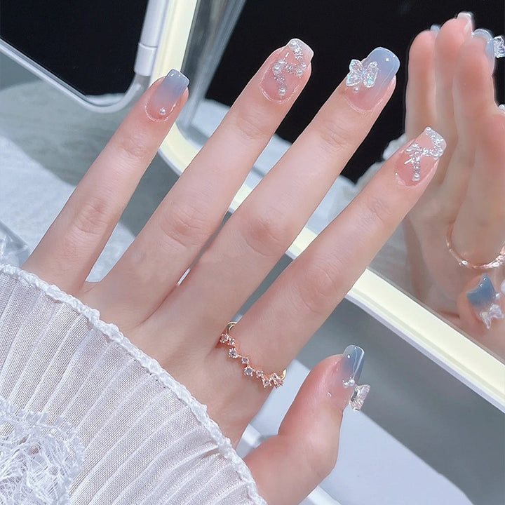 Acrylic nail set with sparkling glitter elements and appealing ombre design Stornfield