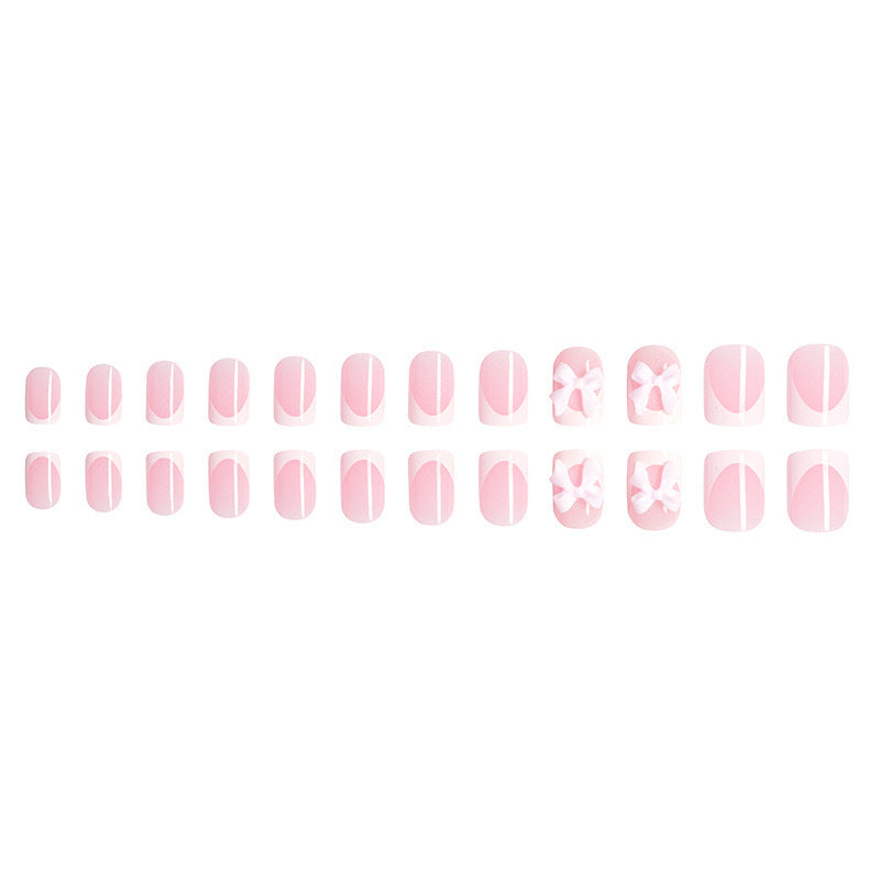 Artificial nails with cute bow designs Stornfield