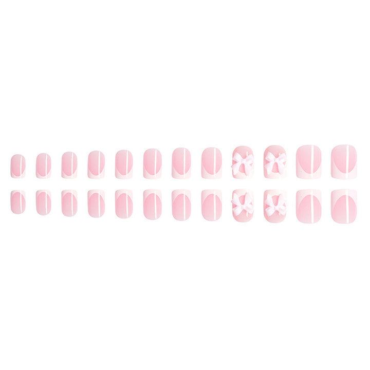 Artificial nails with cute bow designs Stornfield