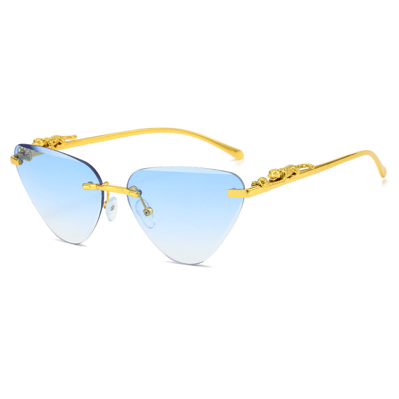 Women's Designer Sunglasses with Creative, Triangular Frame and Elegant Gold Accents Stornfield
