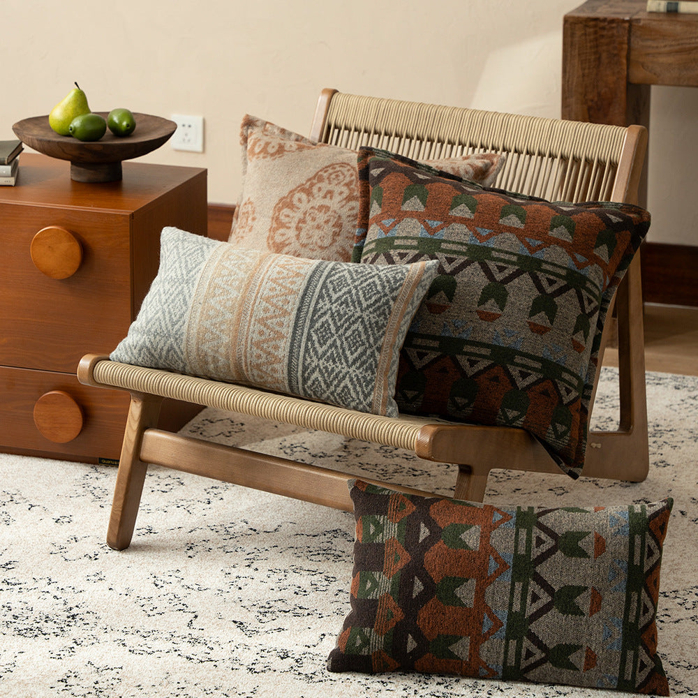 Square decorative sofa cushion with jacquard-woven ornament and soft bouclé surface Stornfield