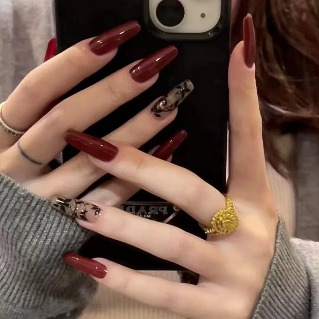 Artificial nails with elegant black and white patterns Stornfield