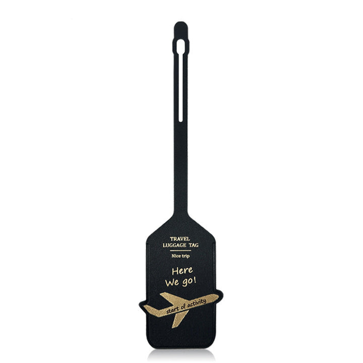 premium leather travel luggage ID tag with embossed airplane motif and adjustable strap Stornfield