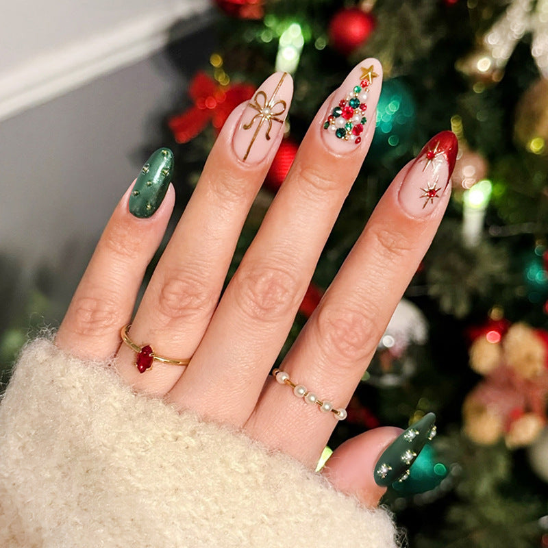 Festive artificial nail set with Christmas motifs and glitter accents Stornfield