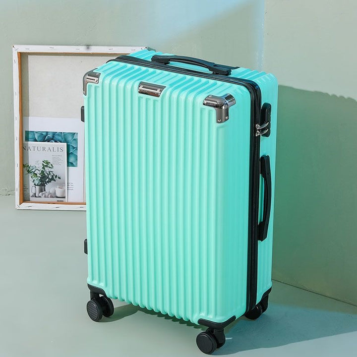 Hard shell suitcase with 360-degree wheel system and integrated safety feature Stornfield